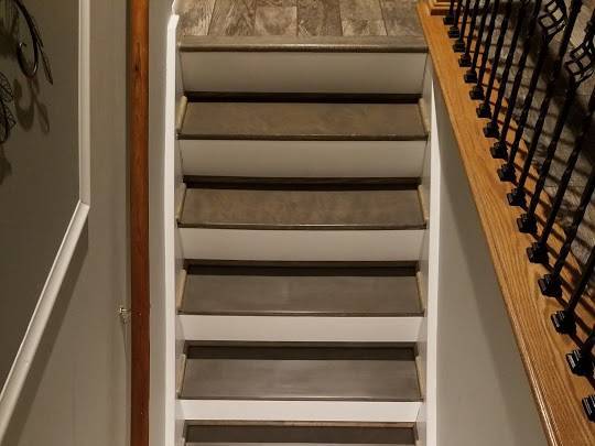 Stair tread hardwood floor installation in Milford MI